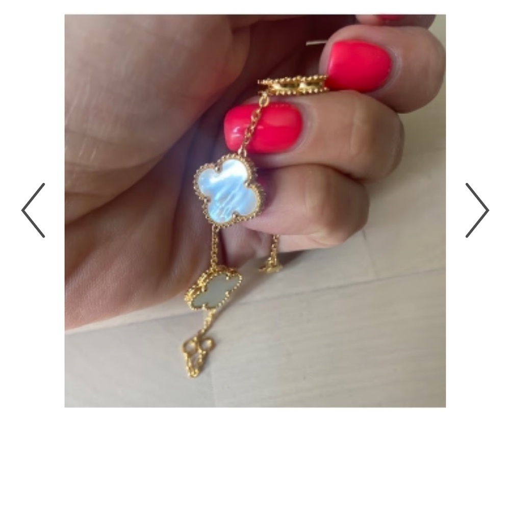 Gold and White Clover Bracelet in velvet box